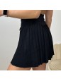 MINIGONNA PLISSE' CON PATTE E BOTTONI NERA